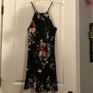 black floral dress scallop around top